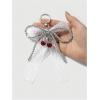 imageMakeMeChic Womens Y2K Bow Keychain Bag Charm Ribbon Metal Retro AccessoriesWhite