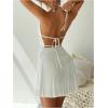 imageMakeMeChic Womens 2 Piece Outfits Tie Backless Halter Tops and Pleated Mini Skirt SetsWhite