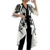 image:imageMakeMeChic Womens Floral Bell Sleeve Blouse V Neck High Low Tie Front Work Dressy TopsMulticolor Short Sleeve