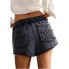 image:imageMakeMeChic Womens Casual High Waisted Linen Shorts with Rivet Star Decor Wide Leg Cute Ruffle Shorts Pockets Vacation OutfitBlack
