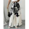 image:imageMakeMeChic Womens Boho Fall Floral Print Pants Business Work Elastic Waist Wide Leg TrousersBlack and White