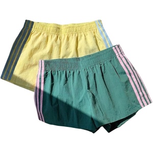 image:imageMakeMeChic Womens 2 Pack Striped Running Shorts Summer Track Workout Athletic ShortsPale Yellow