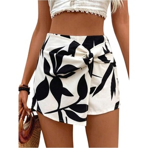 image:imageMakeMeChic Womens Floral Boho Shorts Twist Front Elastic Waist Summer Beach Vacation ShortsWhite and Blakc